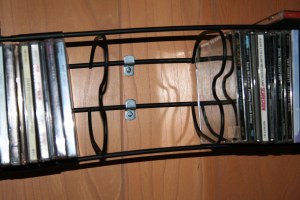 mirror brackets holding CD rack
